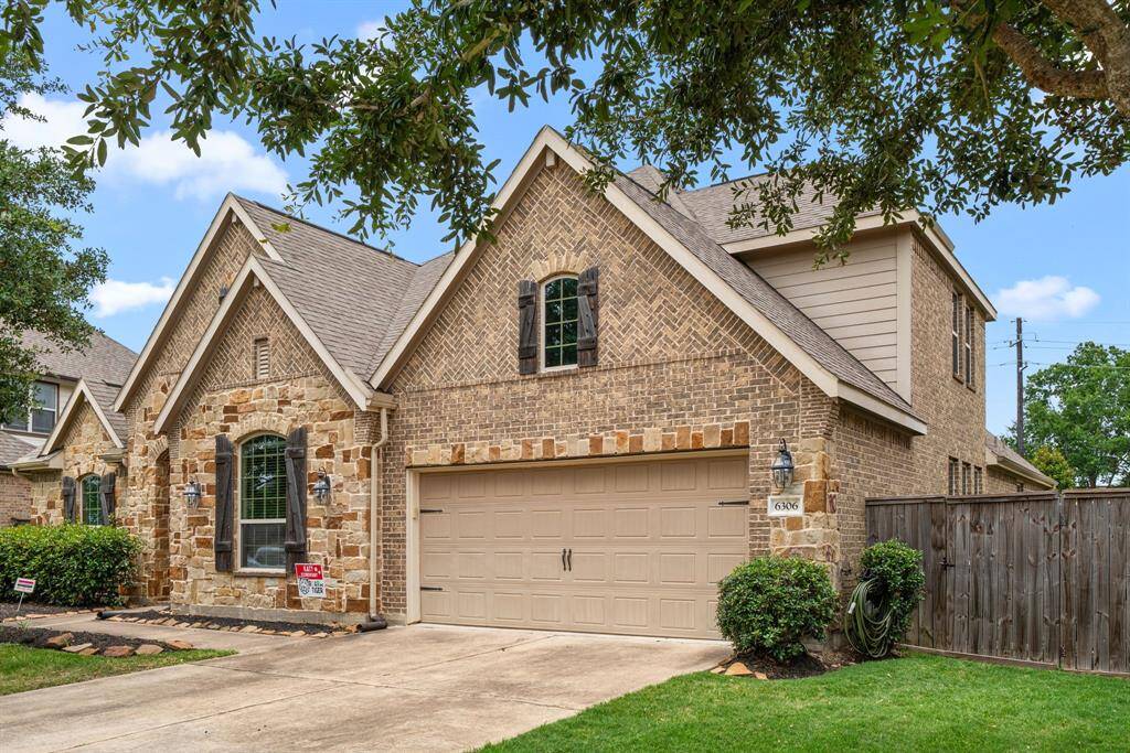 Welcome home to 6306 Sunstone Falls Ln