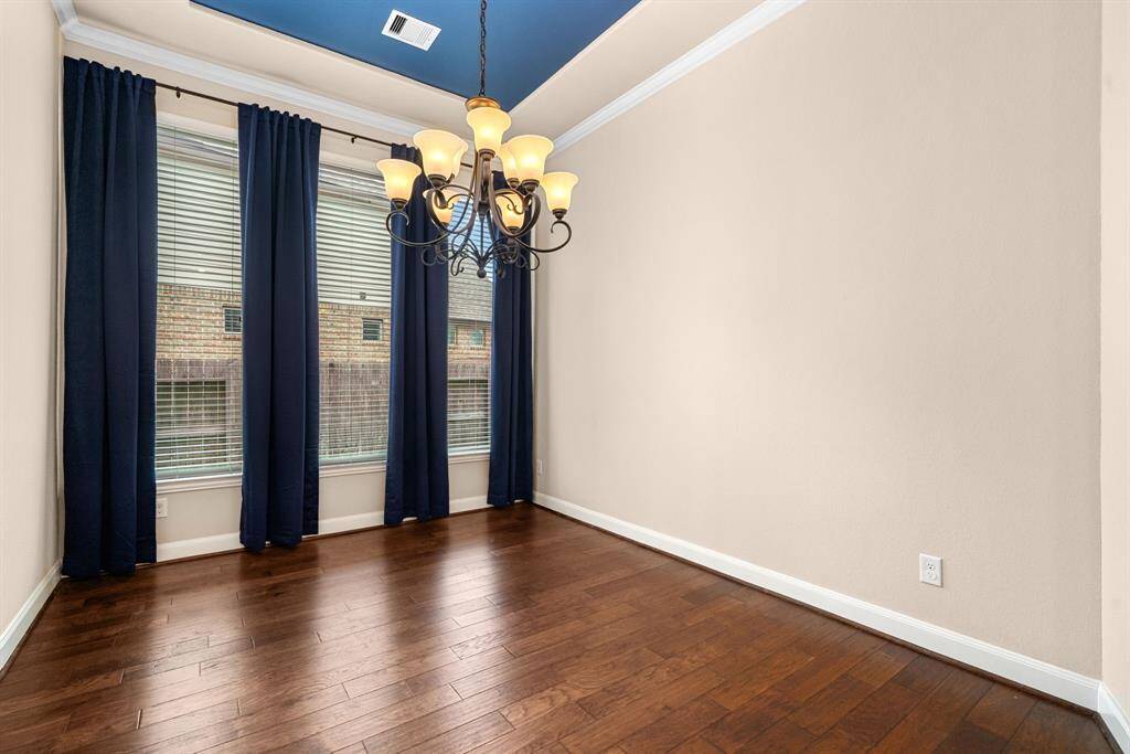 Formal dining room has plenty of space for all your furniture.