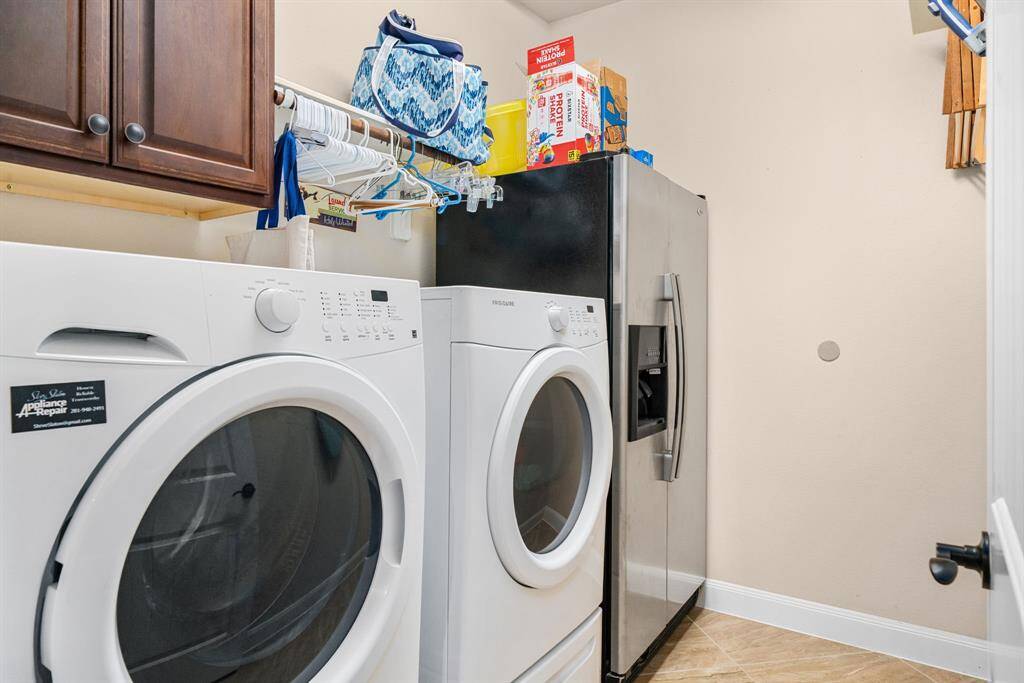 Laundry room on the main floor is convenient to the home.