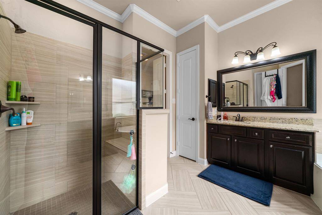 Primary bath with separate shower and corner tub is exactly what you are looking for.