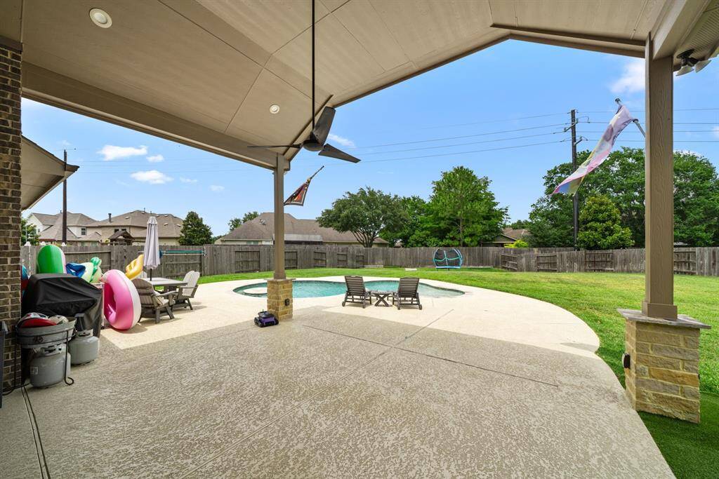 Can you say "HUGE Backyard"   This is almost a half-acre lot!!  There is a pool and still have room to play soccer.