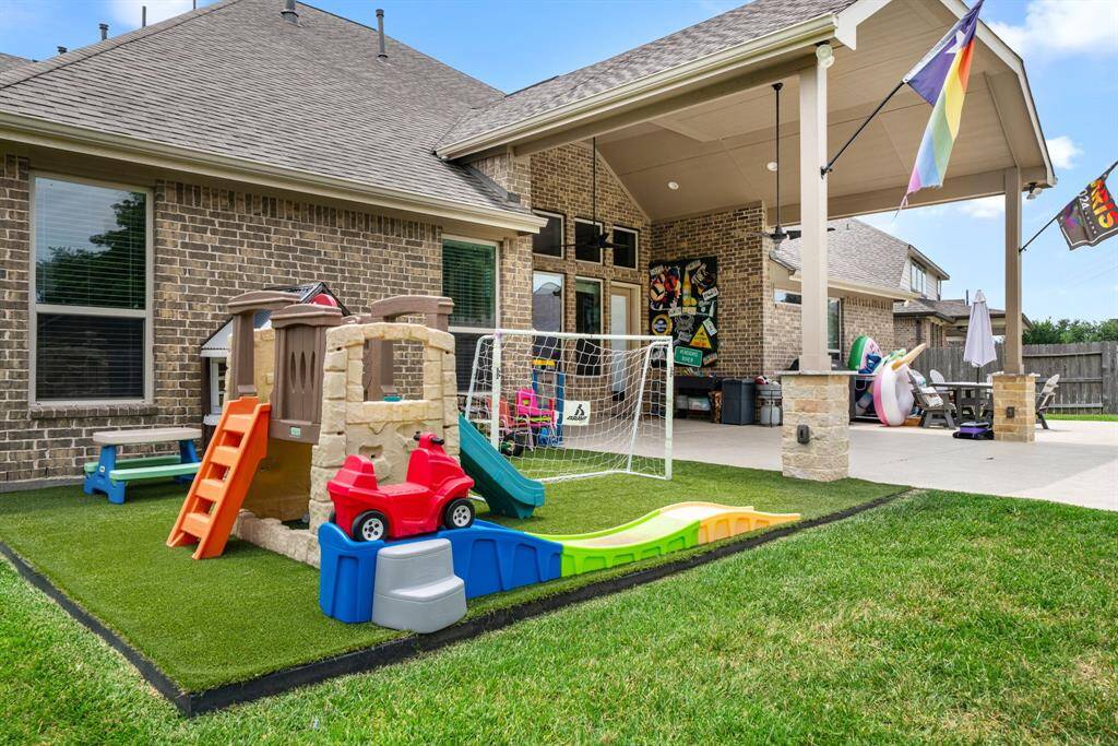 Exceptional astro-turf play area near the home is great for safe play and less grass stains.
