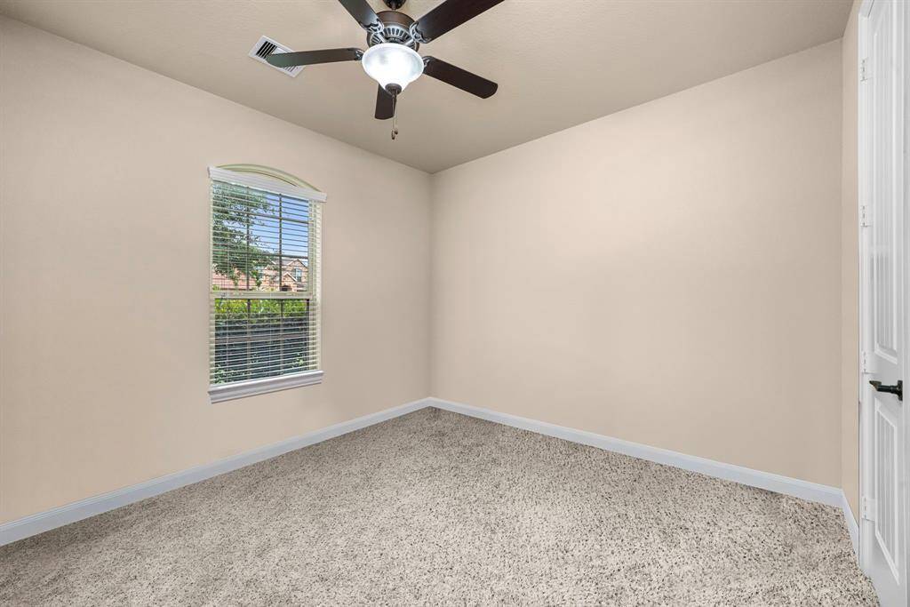 4th bedroom in the front of the home has a full bathroom just outside the door.