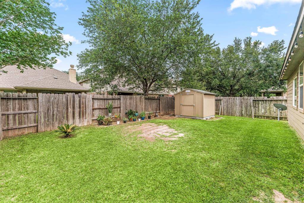 No back neighbors and a tall fence create a secluded retreat where you can relax, grill, or simply watch the sunset in peace.