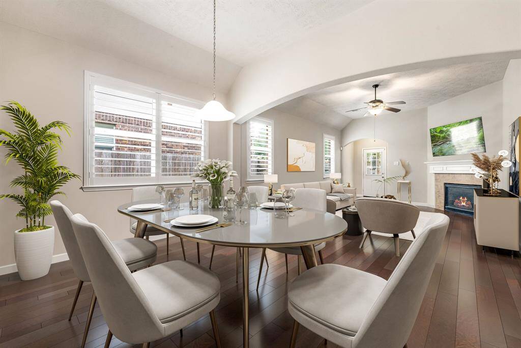 Gather family and friends in this light-filled dining room, where expansive sightlines and elegant finishes make every meal feel like a special occasion. *Virtually Staged