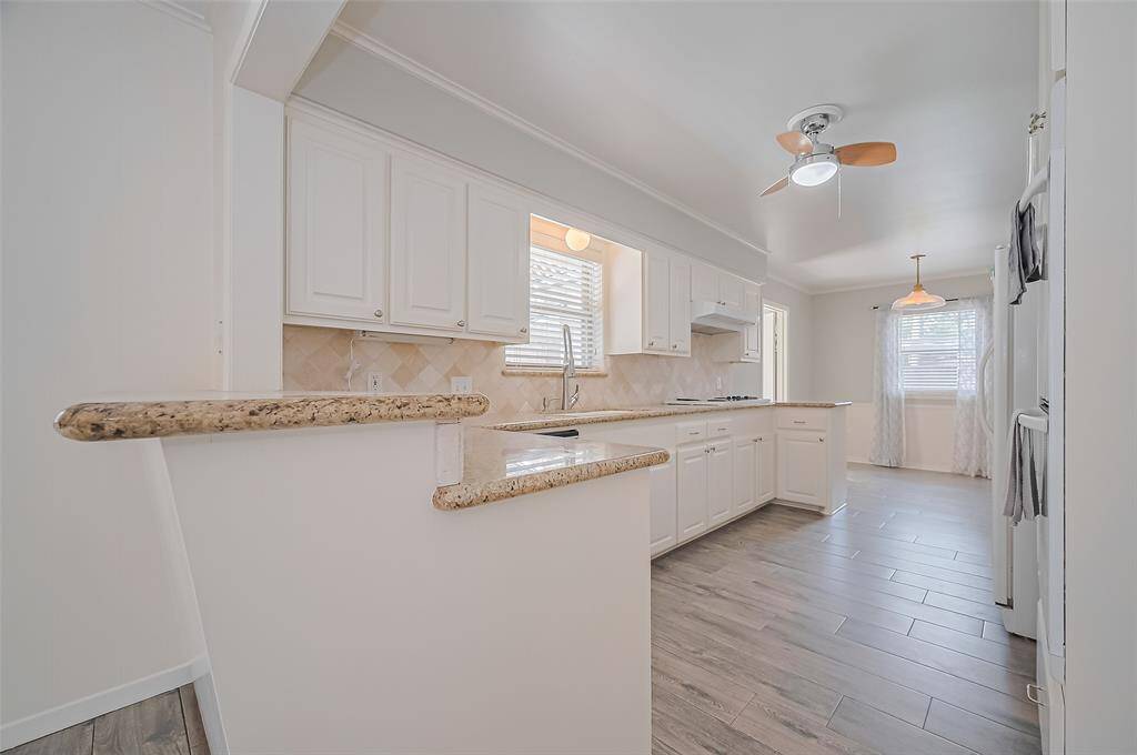 Additional view of the kitchen.