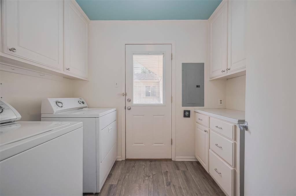 View of the utility room. Washer and dryer are staying with the home.