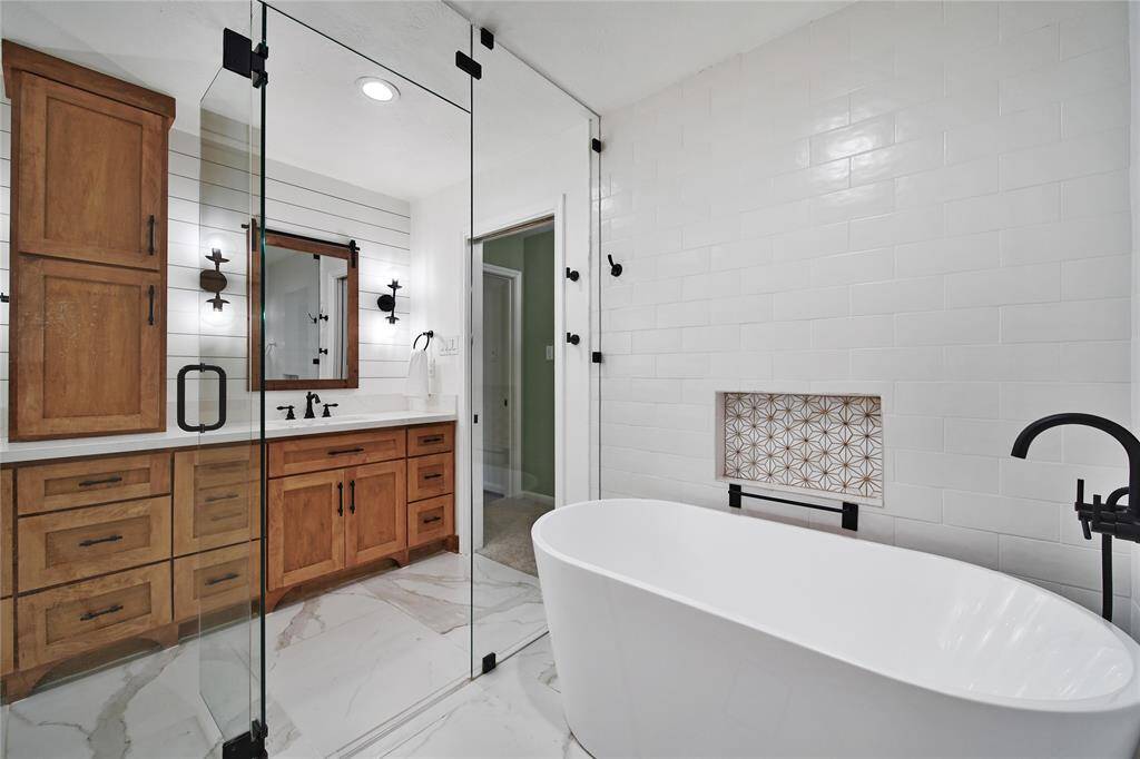 Enjoy a relaxing soak in the freestanding tub and let your worries melt away.