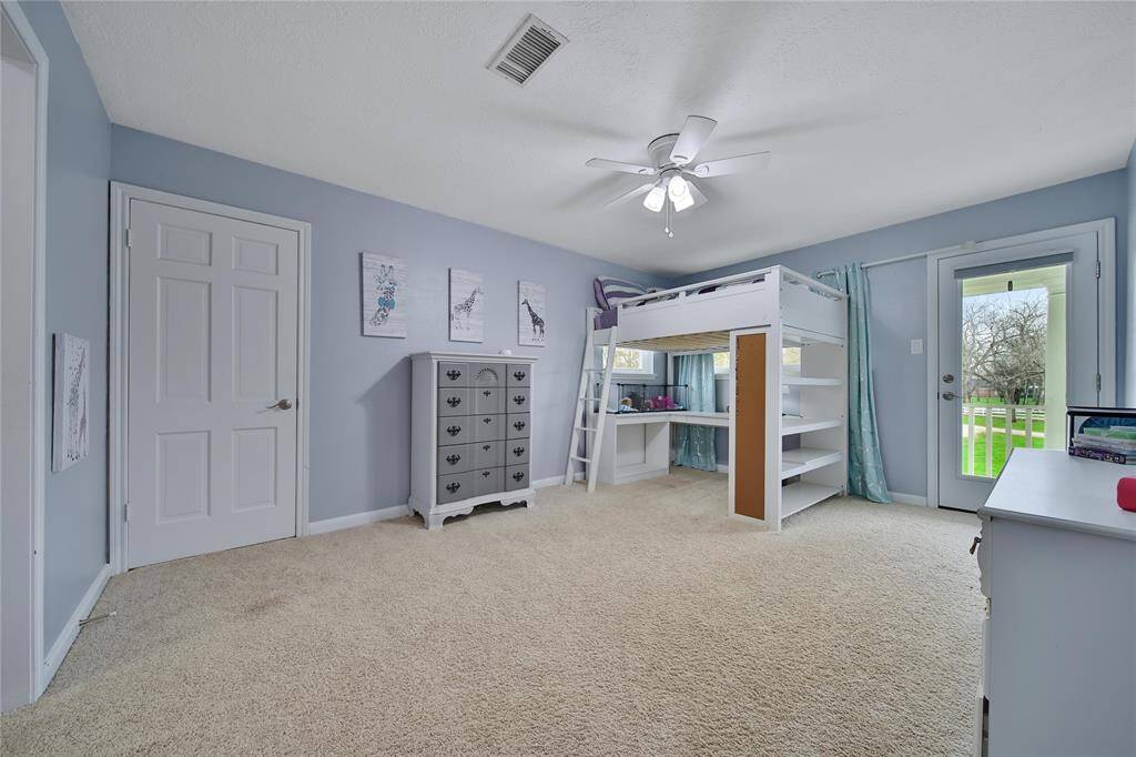 In addition to a walk in closet, this bedroom also has a "secret" space that can used as fun hangout spot or for extra storage. Dont miss it!