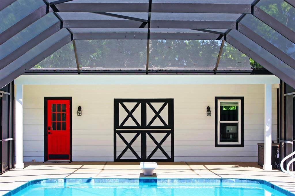 This absolutely charming pool house has a Bedroom, Full Bath and extra storage if you need it! The pool house has everything you need to ensure that your trip to the pool is a great one and that no wet feet make their way into the main house! The top of the doors open to create a serving window.