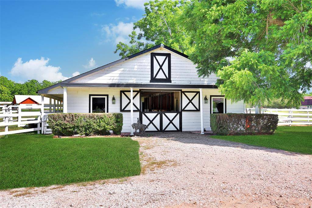 The barn is equipped with 7 stalls, large runs, separate tack room, feed room, equipment room, wash rack and extensive barn loft for all storage needs.  The connecting 3 acre pasture with all-weather shelter and adjacent 1 acre pasture provides ample turnout and pasture rotation options.