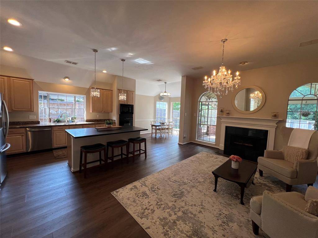 Formal dining room open to formal living room.