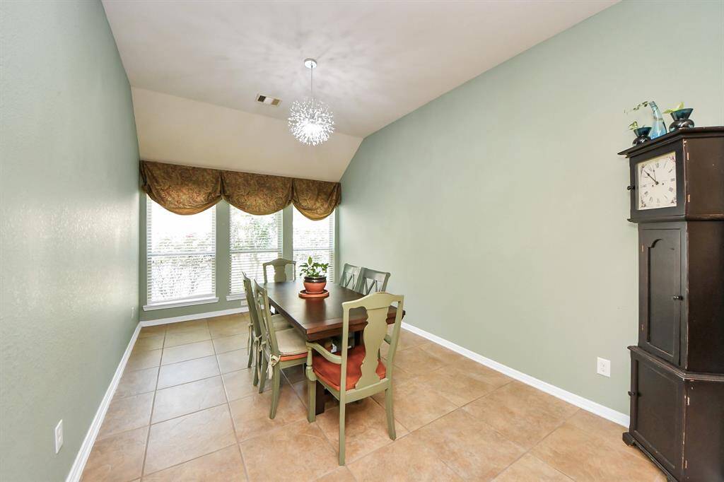 Just off the kitchen, this dining space offers a seamless flow for hosting.