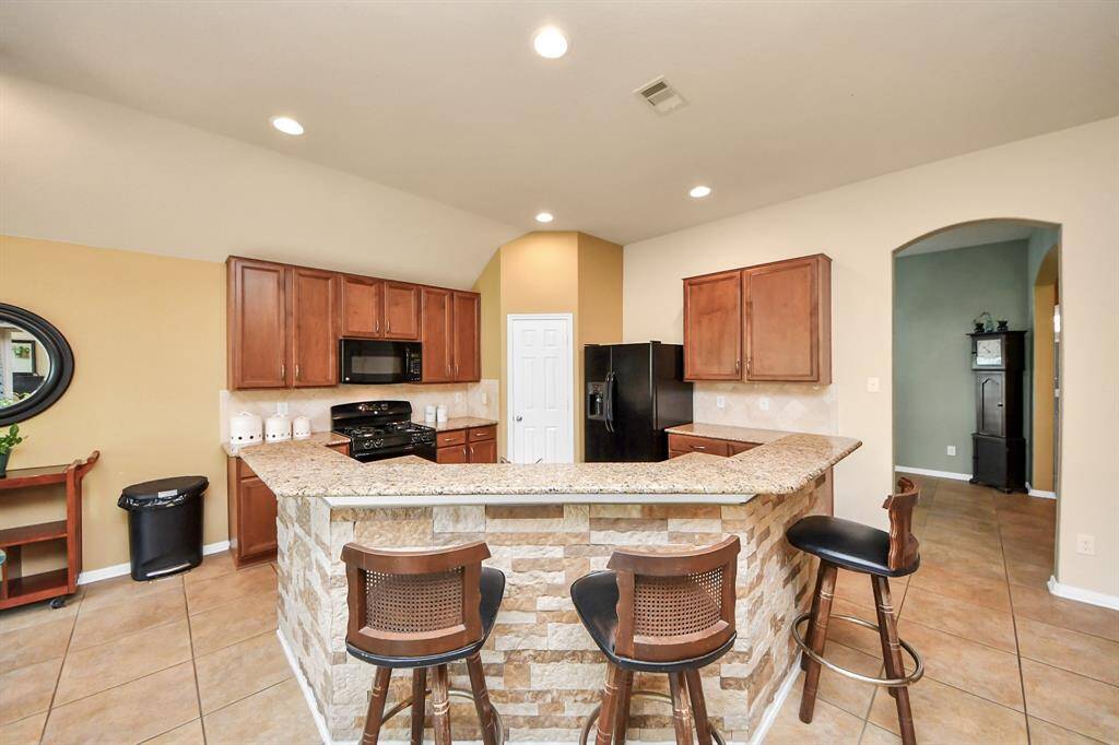 Bar seating perfect for casual meals or entertaining.