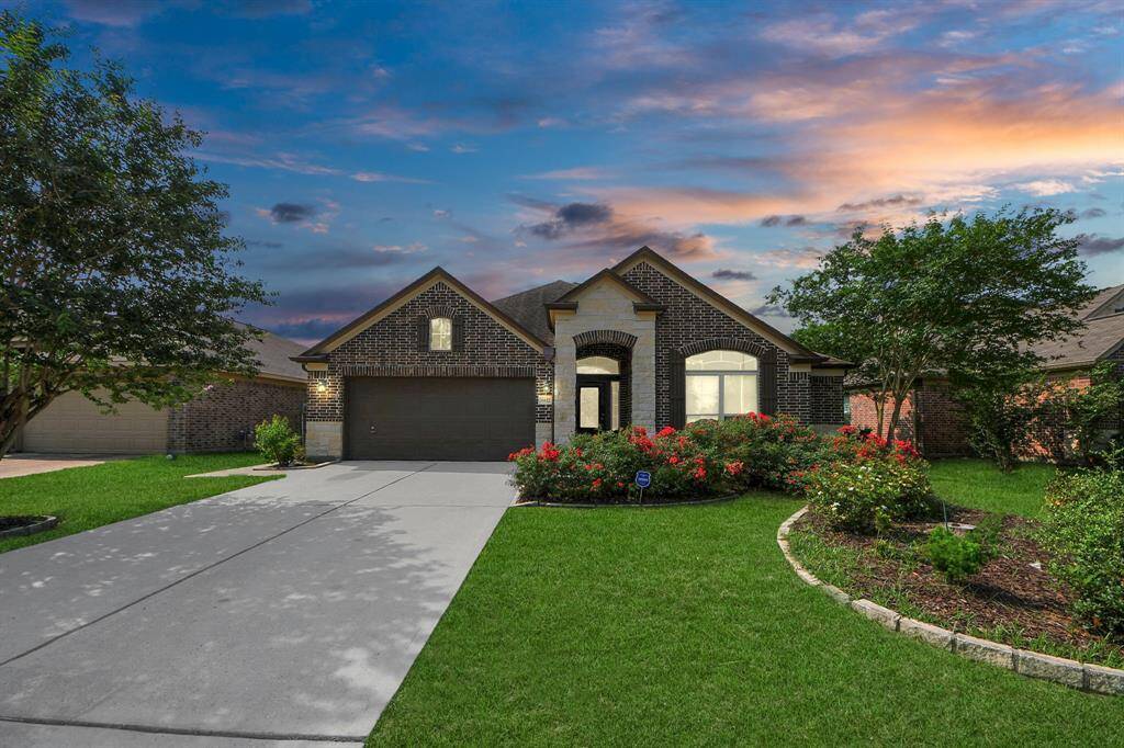 Inviting curb appeal with well-maintained landscaping.