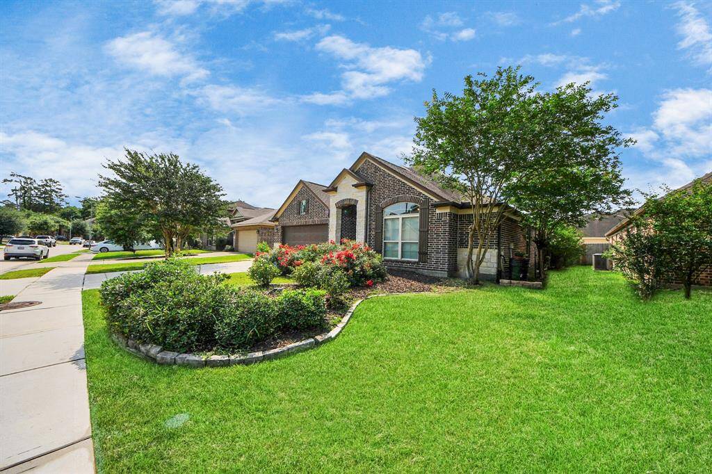 Spacious yard and sprinkler system.