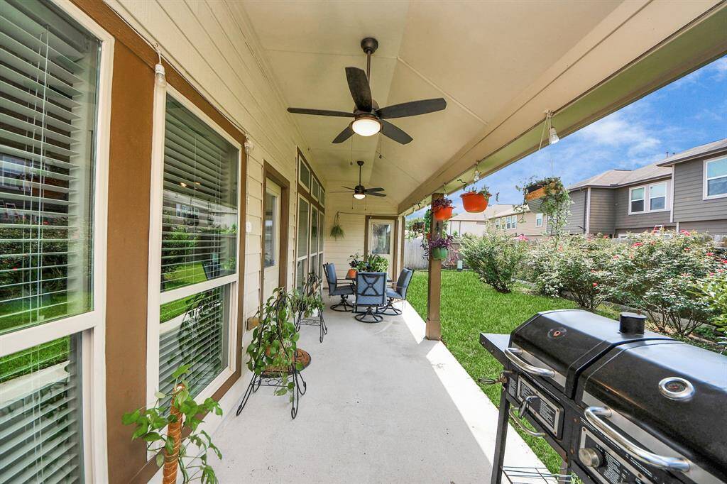 Covered patio area for relaxing or entertaining.