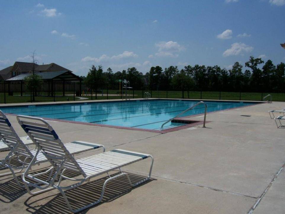 Neighborhood amenities with pool and playground.