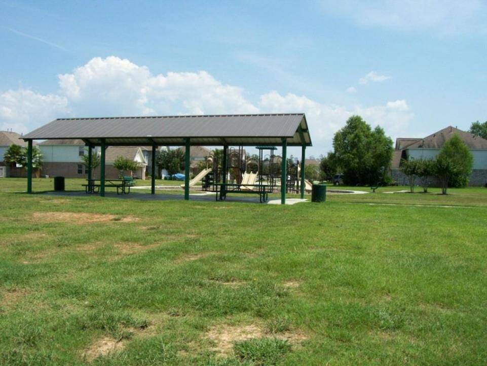 Neighborhood amenities with pool and playground.