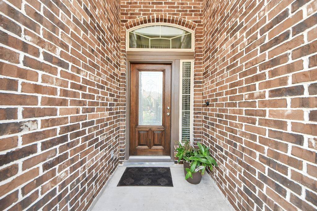 Welcoming front door and covered entry.