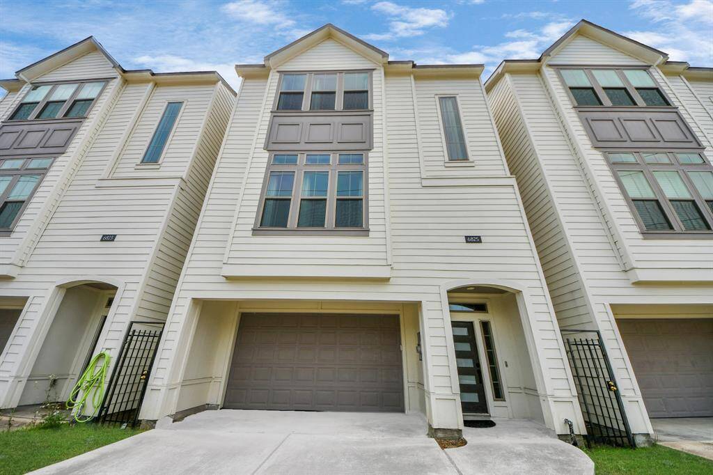 Welcome to 6825 Sidney St with your own PRIVATE DRIVEWAY!