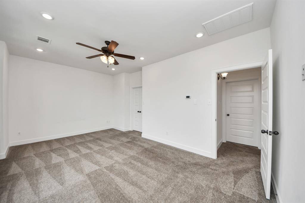 The primary bedroom is situated on the third floor