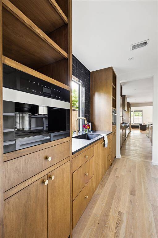Scullery with Miele microwave and built-in coffee maker
