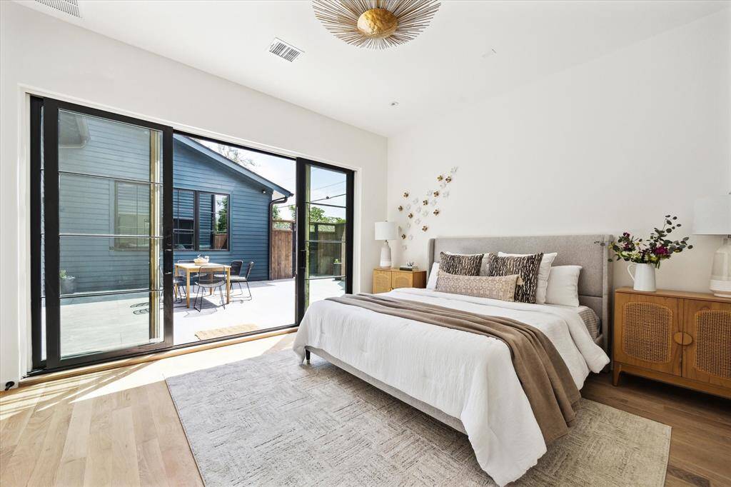 Owner's suite opens to a private courtyard with outdoor fireplace