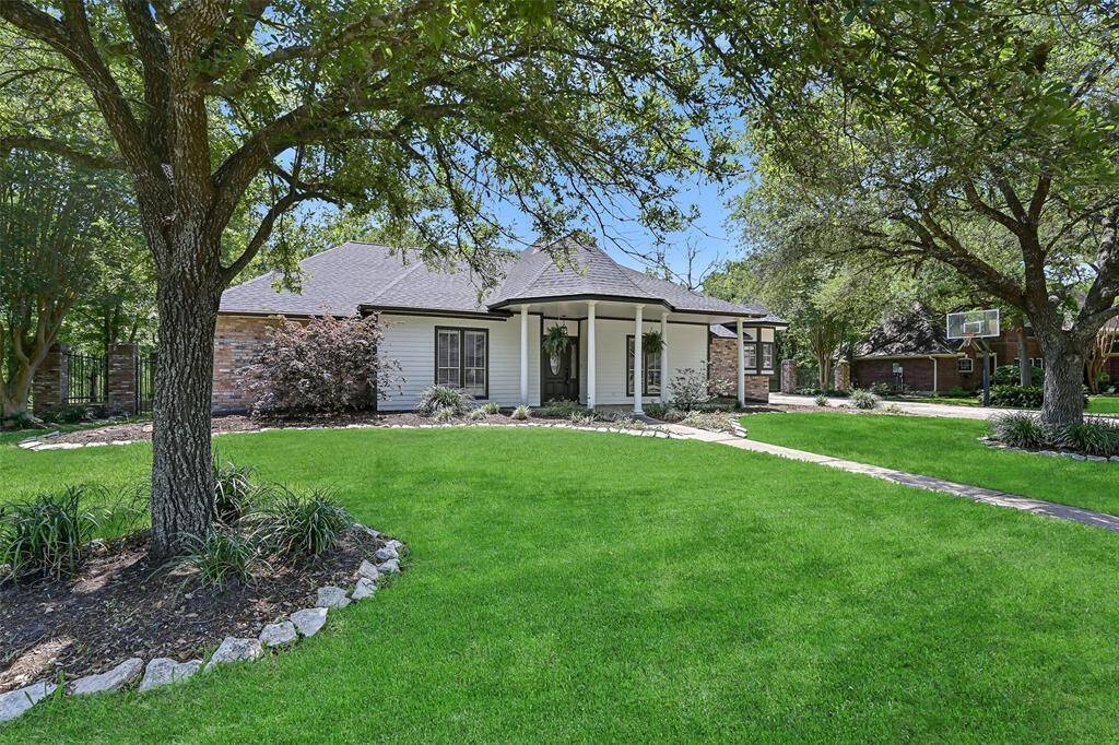Welcome to 704 Balmoral Court! Thischarming single-story bungalow boasts a quaint front porch, ample parking space, manicured landscaping, and sprawling oak trees that dot this rare and magnificent 1.17-acre creekside lot that has NEVER flooded!