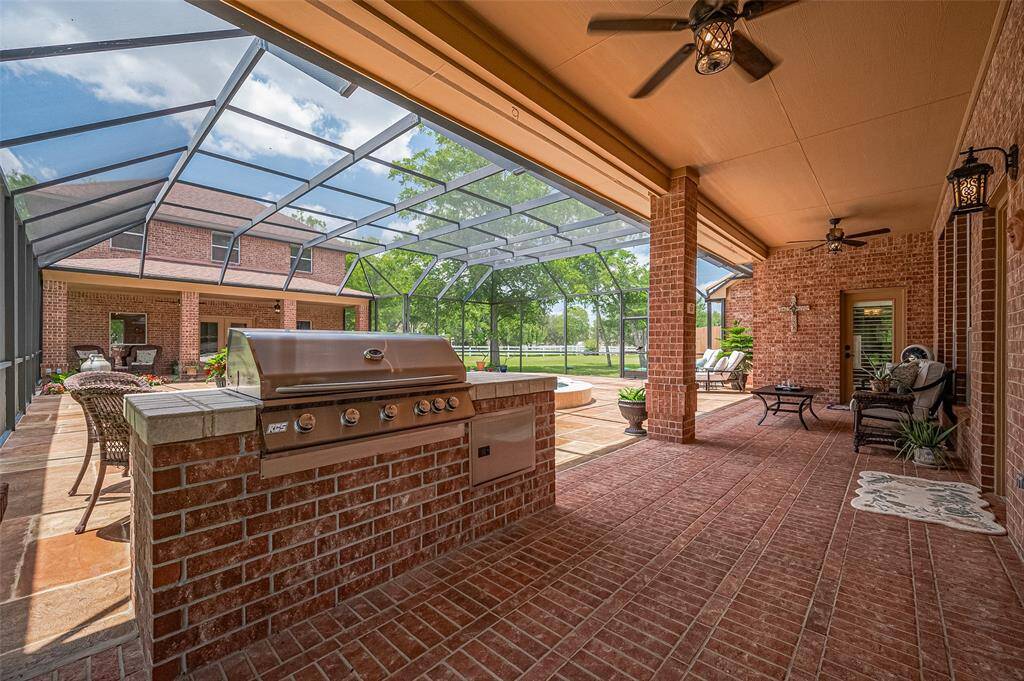 Outdoor grill and covered patio.  Just waiting for a fun get together.