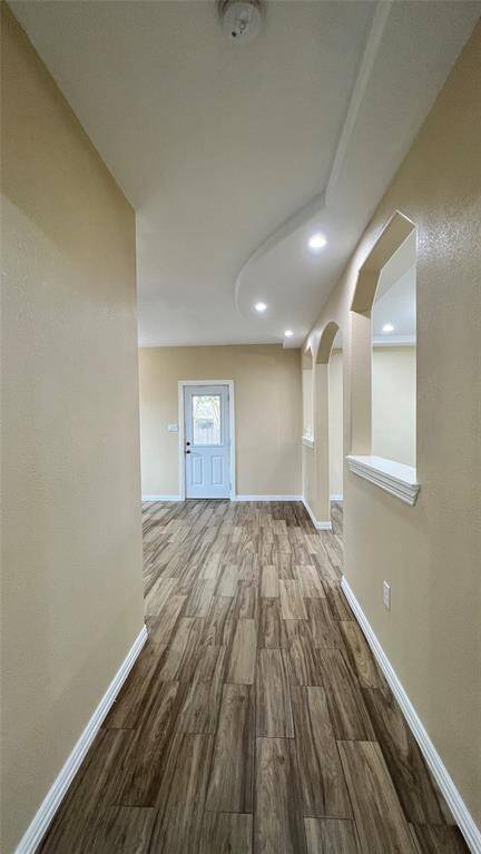 Hallway to living room and kitchen