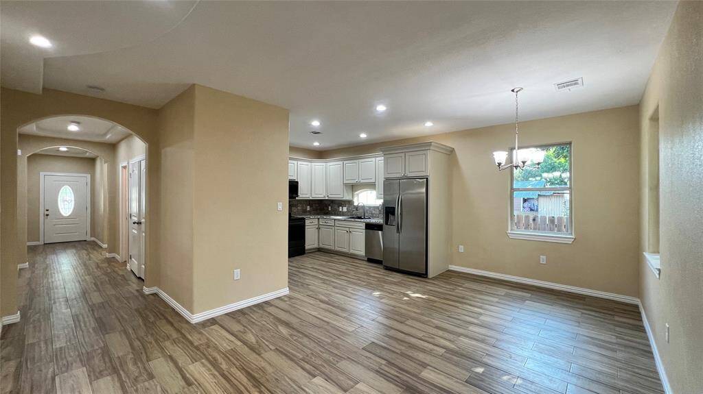 View from back door to kitchen and entrance