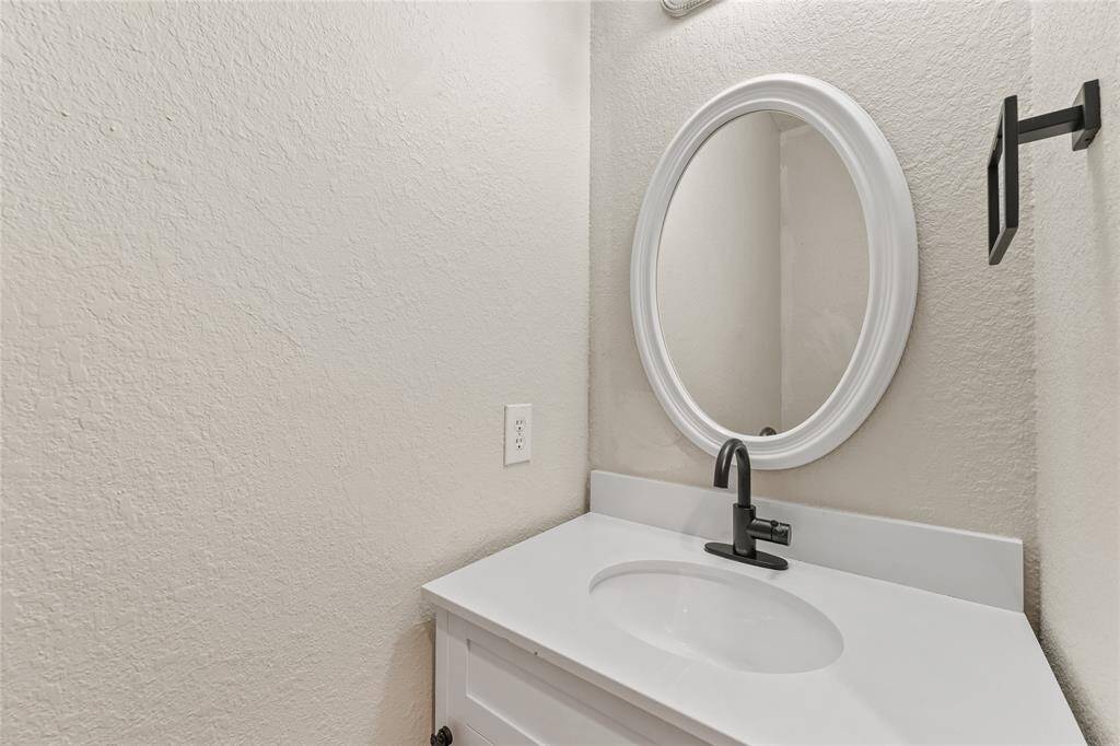 The half bath on the first floor.