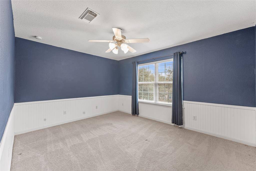 Another secondary bedroom also with a spacious walk in closet.