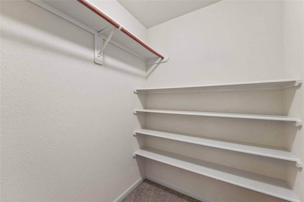 Storage closet in the upstairs game room-- fantastic place to store toys or holiday decor. This property has tons of storage space!!