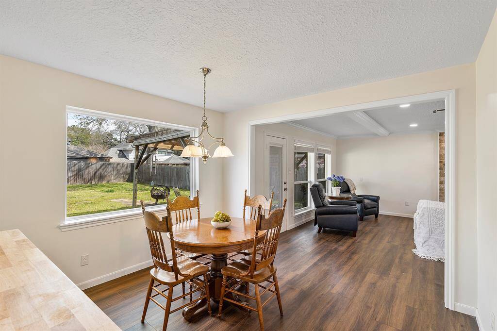 Cozy breakfast nook seamlessly connected to the inviting living area.
