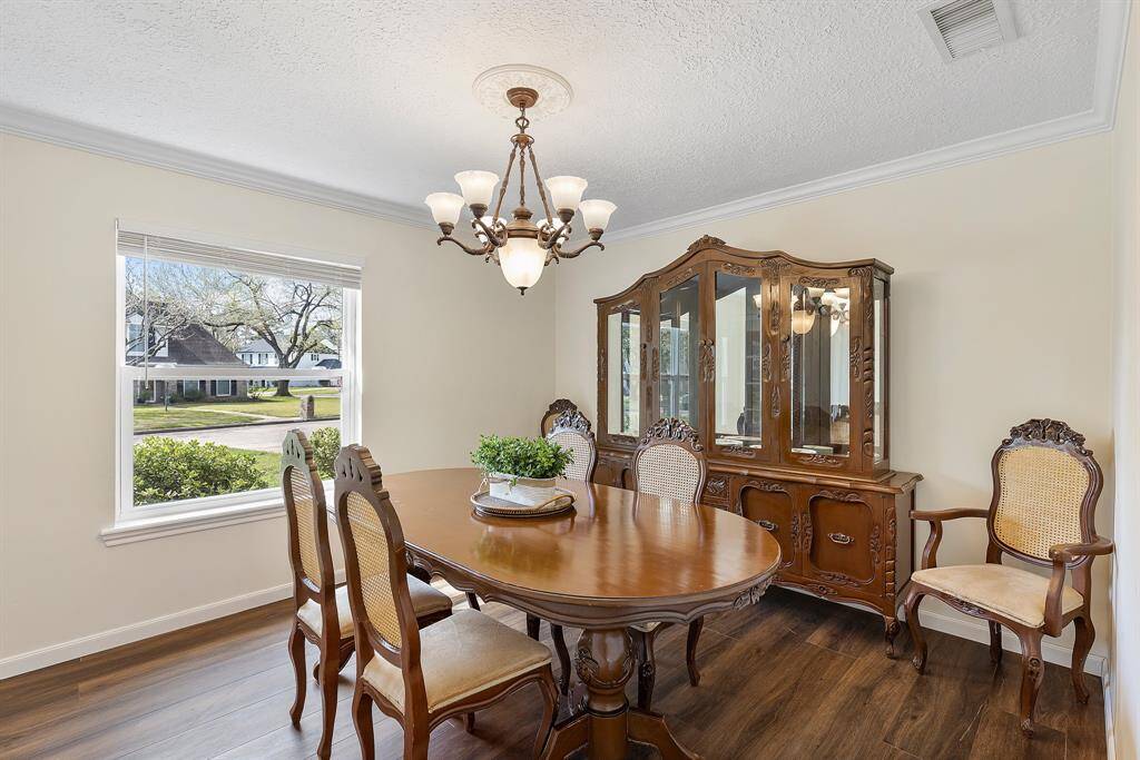 Bright and versatile formal dining room, perfect for an office space.