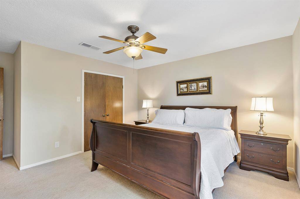 King size bed fits perfectly with ample space. Room has his and hers closets.