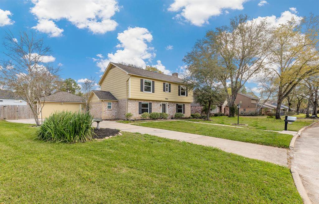 Front yard has ample space as well with a side landscape area.