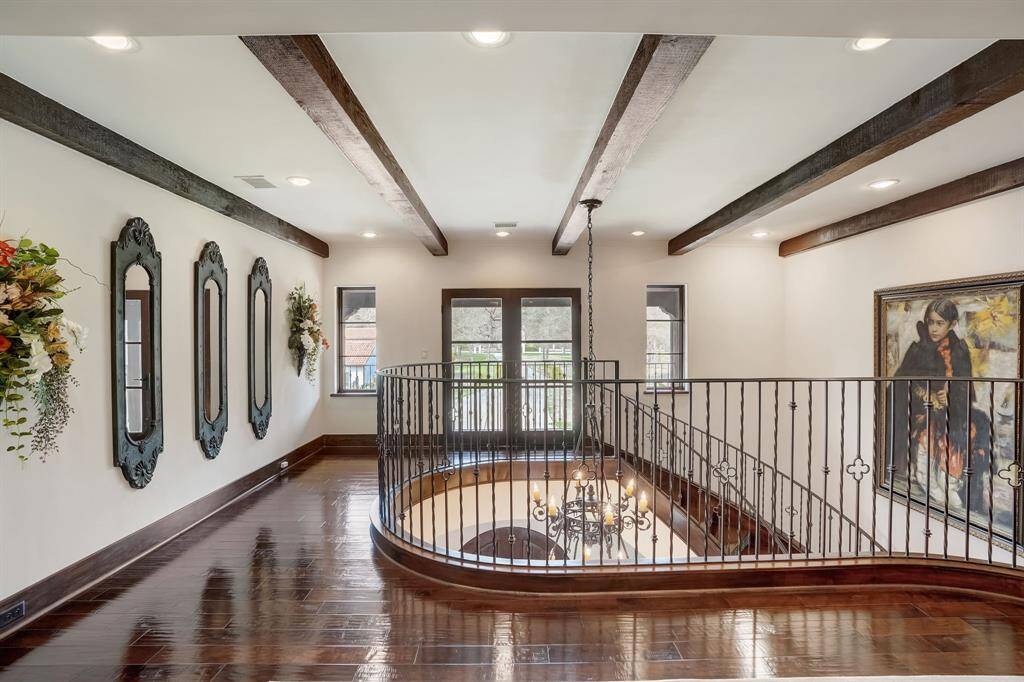 Elegant second-level spiral staircase.