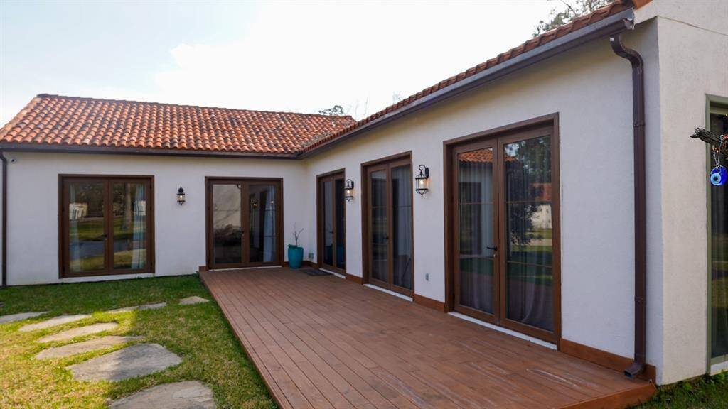 Your personal escape starts at this inviting deck entrance, perfect for relaxing or entertaining.