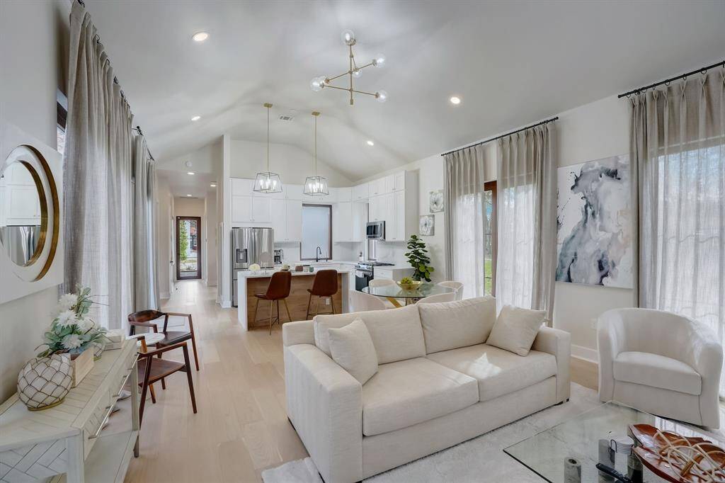 Open-concept living at its best: a welcoming living room and a stylish kitchen.