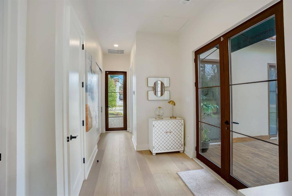 A beautifully designed hallway, offering easy access to the heart of the casita's living areas.