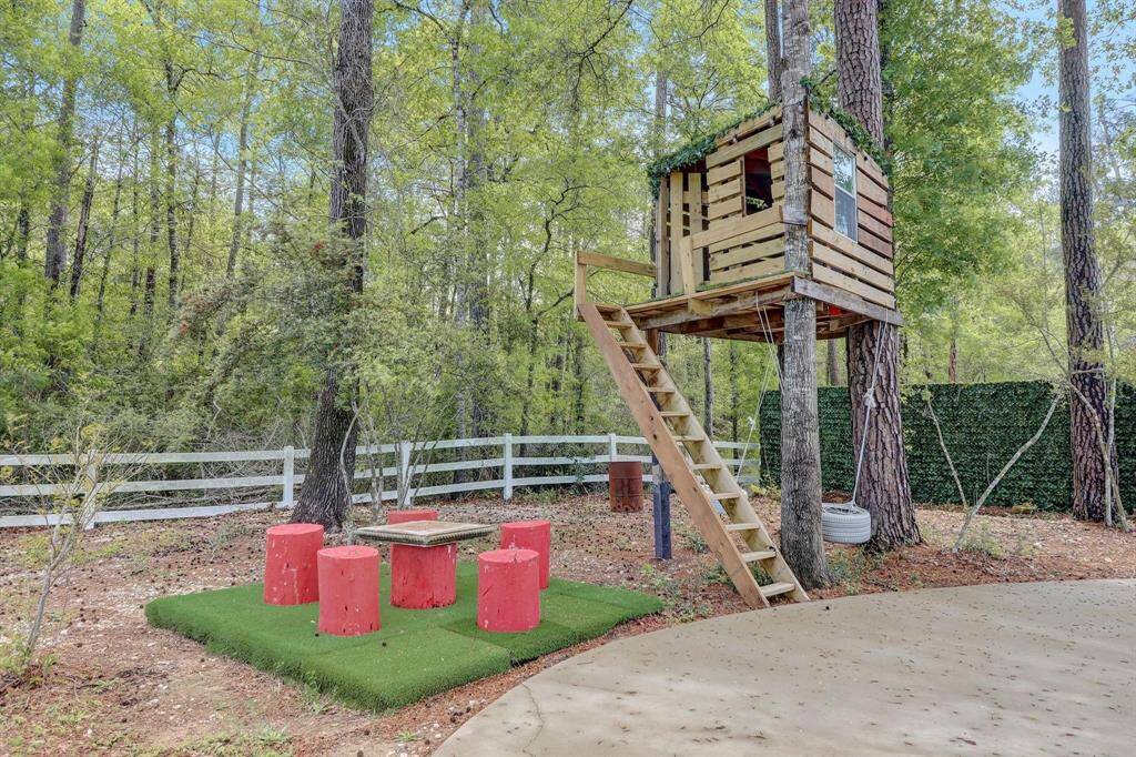 Whimsical kids' treehouse, the perfect hideaway for endless outdoor adventures and imagination.