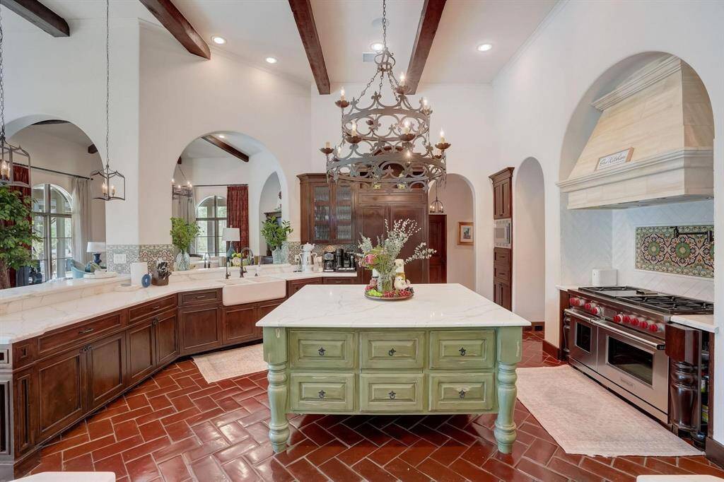 Chef’s dream kitchen featuring modern appliances, sleek finishes, and plenty of space for culinary creativity.