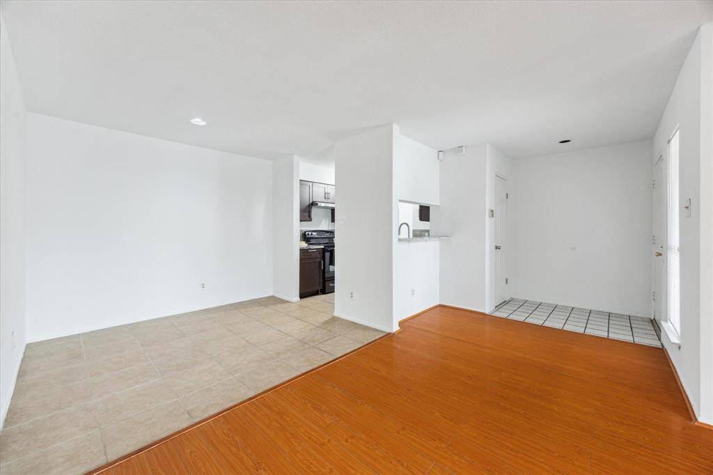 View from the living room, looking towards the dining area and kitchen.