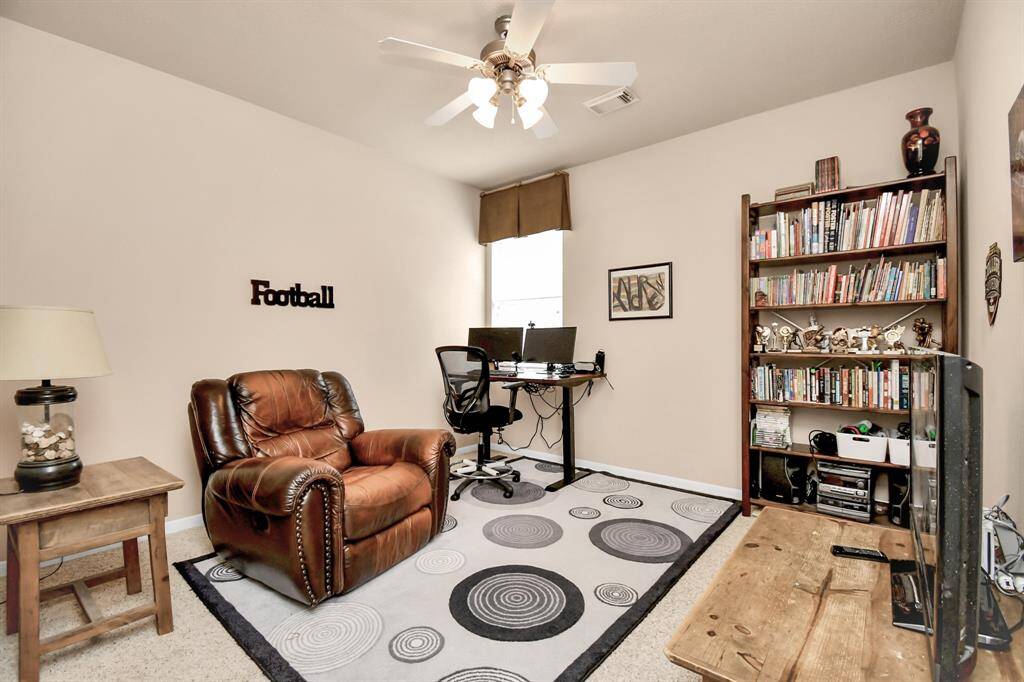 One of the secondary bedrooms has been repurposed as a TV/gaming area, offering versatility and additional entertainment space to suit your lifestyle.