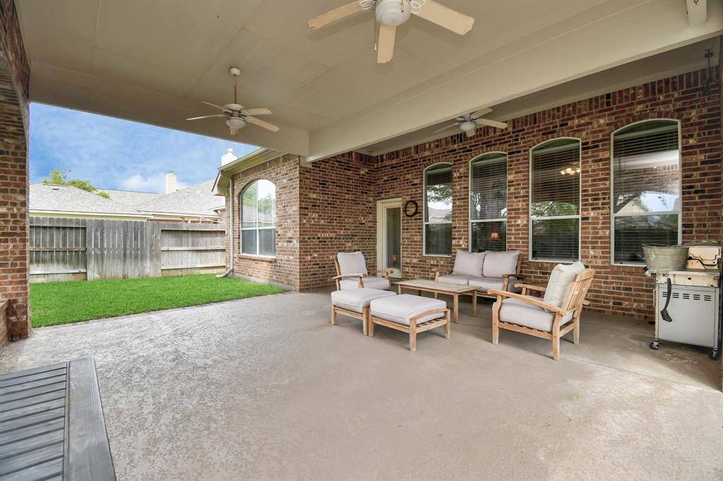 There is room for grills, outdoor seating, or even the installation of an outdoor kitchen, making this patio the perfect spot for entertaining and enjoying the outdoors.