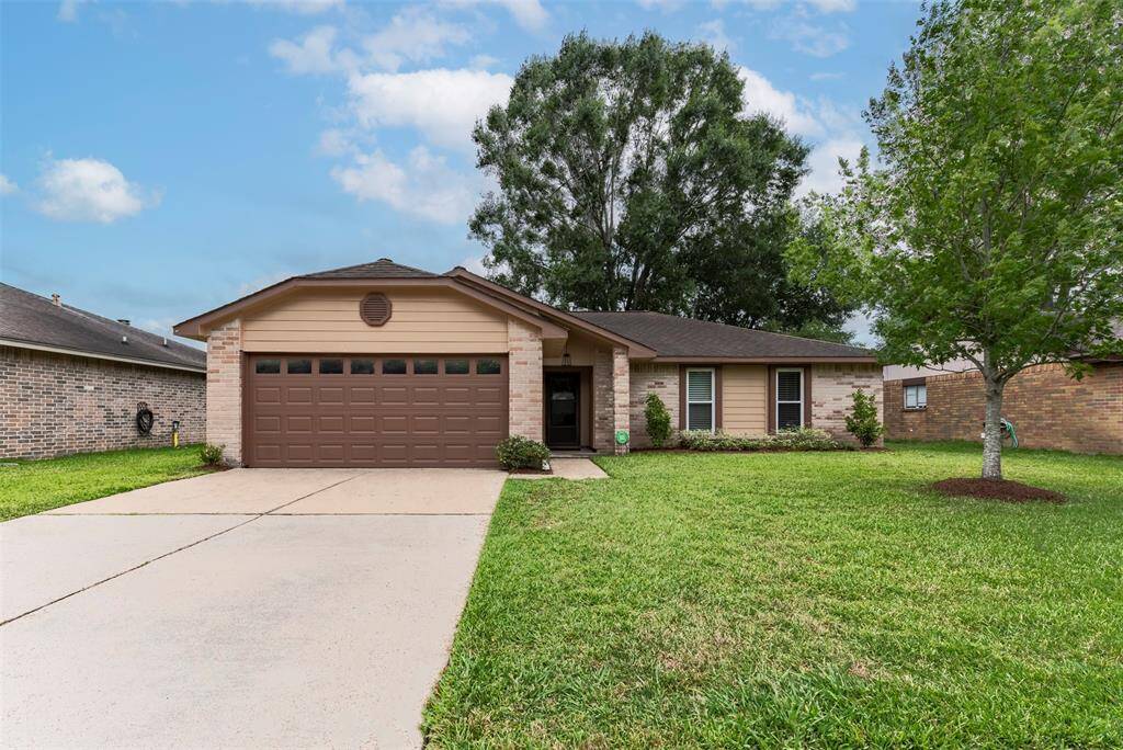 This charming 3/2 brick home features a decorative siding accent that adds contrast and character. A large front yard, with manicured flower beds completes the inviting curb appeal.