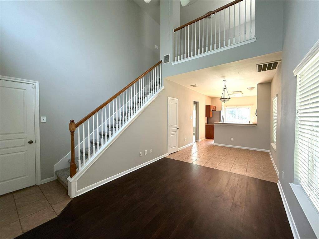 2 story open main living and dining area.